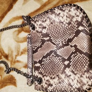 Tan snake skin coach small purse